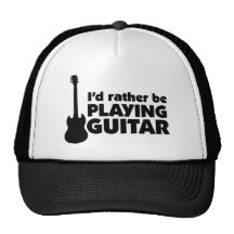 Je jouerais plutôt le chapeau de guitare casquette de camionneur