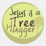 Jesus Hugs trees Round Stickers