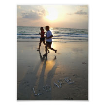 Joggers on the beach during sunset photo art
