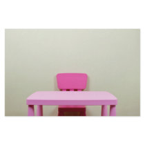 Kids desk and chair against the wall stationery paper