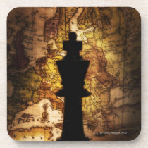 King chess piece on old world map cork coasters