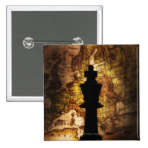 King chess piece on old world map buttons
