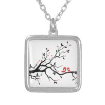 Kissing bird on tree branch with red heart leaves necklace