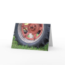 Kitten playing on a tractor cards