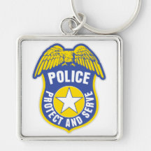 La police protège et sert l'insigne porte-clefs