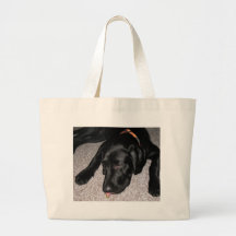 Labrador Puppy Is Eating Grapes Canvas Bags