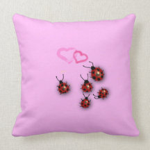 Ladybirds and hearts throw pillows