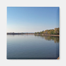 Lake against blue sky fridge magnets