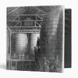 Large barrels in a brewery vinyl binders