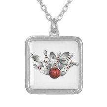 Le pendentif de bowling a soufflé des goupilles