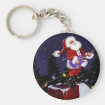 Le père noël jouant la guitare électrique porte-clef