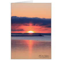 Lever de soleil sur le breakwall cartes de vœux