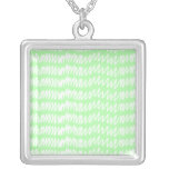 Light green and white squiggle pattern. necklace