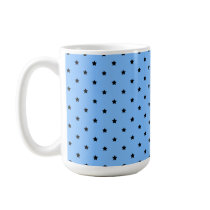 Little black stars on a light blue background. coffee mug