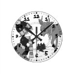 Little boy feeding reindeer in black and white wall clocks