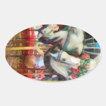 Little Boy on Carousel Oval Stickers