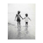little girl and boy holding hands post card