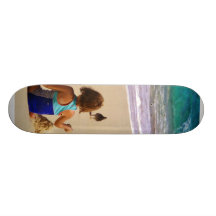 Little Girl Playing in Sand Skate Board