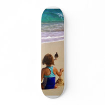 Little Girl Playing in Sand Skate Board