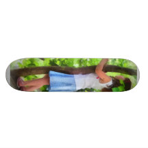 Little Girl Playing in Tree Skate Boards