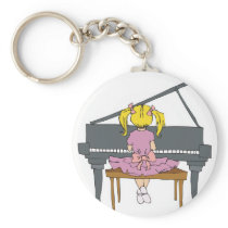 little girl playing piano key chains