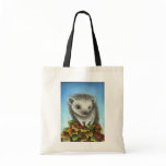 Little hedgehog on a big pile of leaves bags