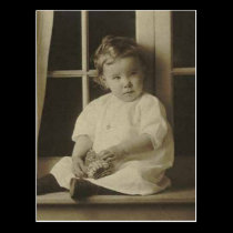 Little kid holding stuffed toy postcards
