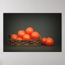 Little red tomatoes in a basket on dark table poster