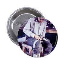 Local resident working on dog sled harness buttons