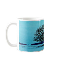 Lonely Tree in a Winter Landscape Mugs