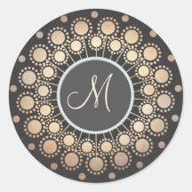 L'or entoure le noir décoré d'un monogramme fleuri autocollants