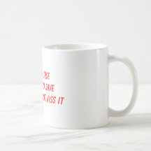 Love a NurseI'm here to saveyour butt, not kiss it Coffee Mug