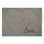 Love- hearts & footprints in the sand at the beach cards