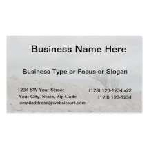 Low key photo of beach dune and dead tree business card