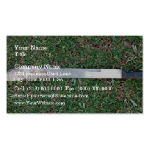 Machete on a grassy ground business card template