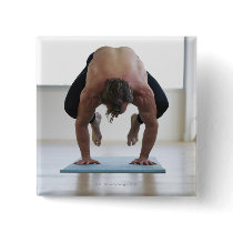 Man doing workout on yoga mat button