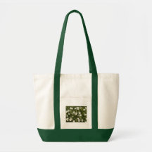 Many little white flowers in a green field tote bags