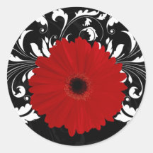 Marguerite rouge lumineuse de Gerbera sur le noir Autocollants