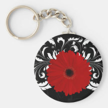 Marguerite rouge lumineuse de Gerbera sur le noir Porte-clefs