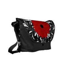 Marguerite rouge lumineuse de Gerbera sur le noir Besace