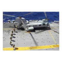 Marines board a CH-46E Sea Knight helicopter