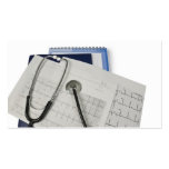 medical stethoscope on cardiogram EKG readings business cards