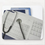 medical stethoscope on cardiogram EKG readings mousepads