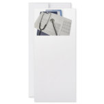 medical stethoscope on cardiogram EKG readings rack cards