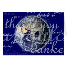 Merci au-dessus de la terre dans différentes langu carte