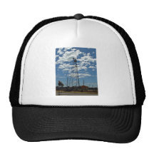 Microwave relay dishes on a communications tower hats