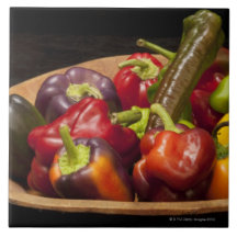 Mixed colours and types of peppers tile