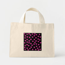Modèle rose et noir lumineux d'empreinte de patte sacs de toile