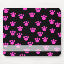 Modèle rose et noir lumineux d'empreinte de patte tapis de souris
