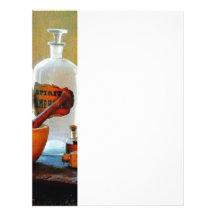 Mortar and Pestle With Bottles Letterhead Design